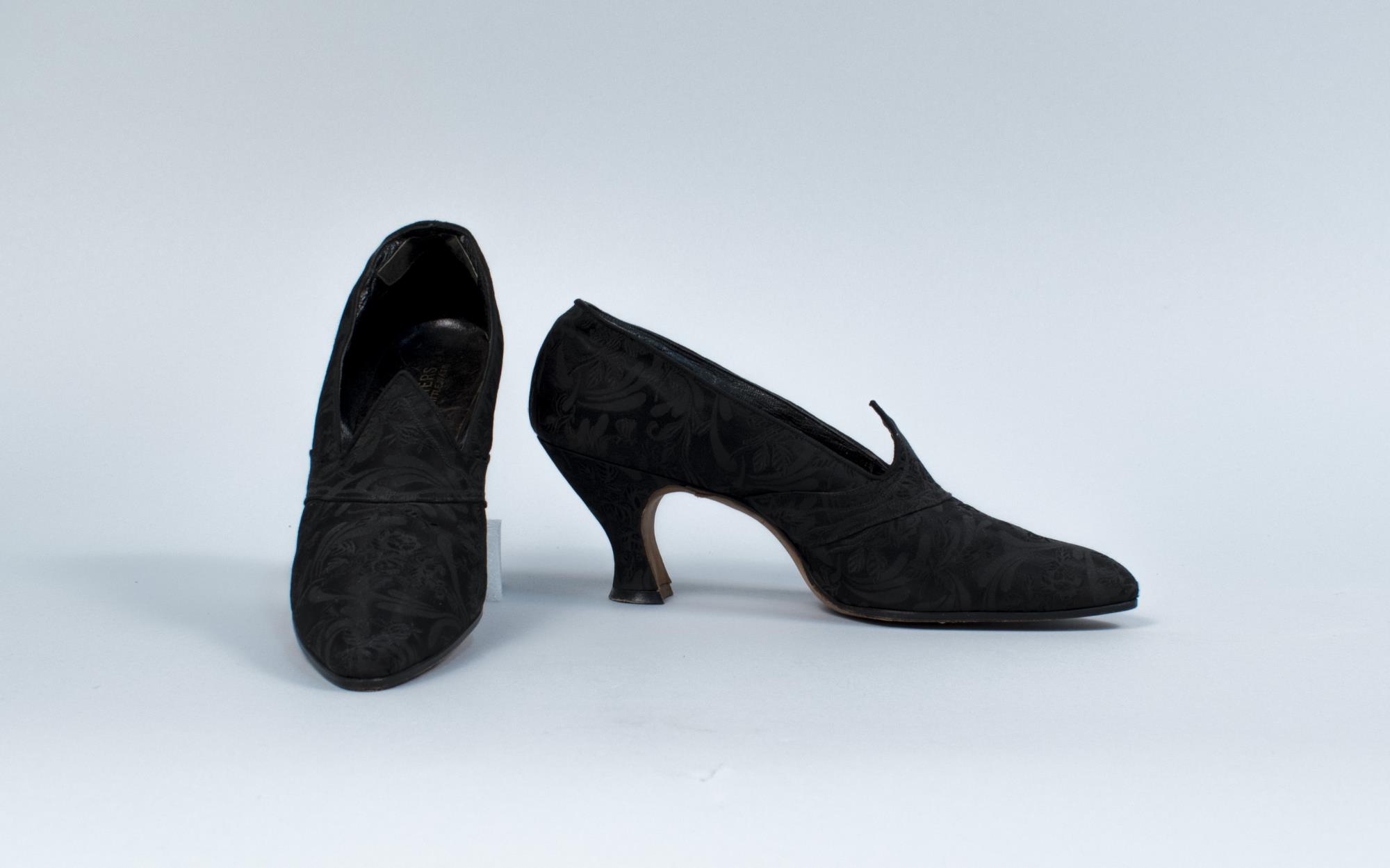 Image of Pair of black brocade heels, ca. 1920