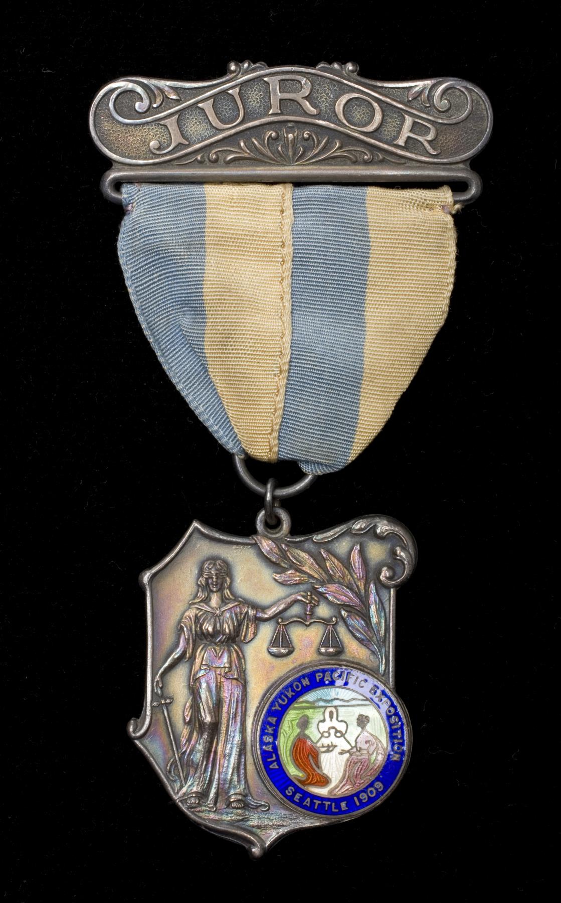 Image of Juror badge for the Alaska-Yukon-Pacific Exposition (AYPE), 1909