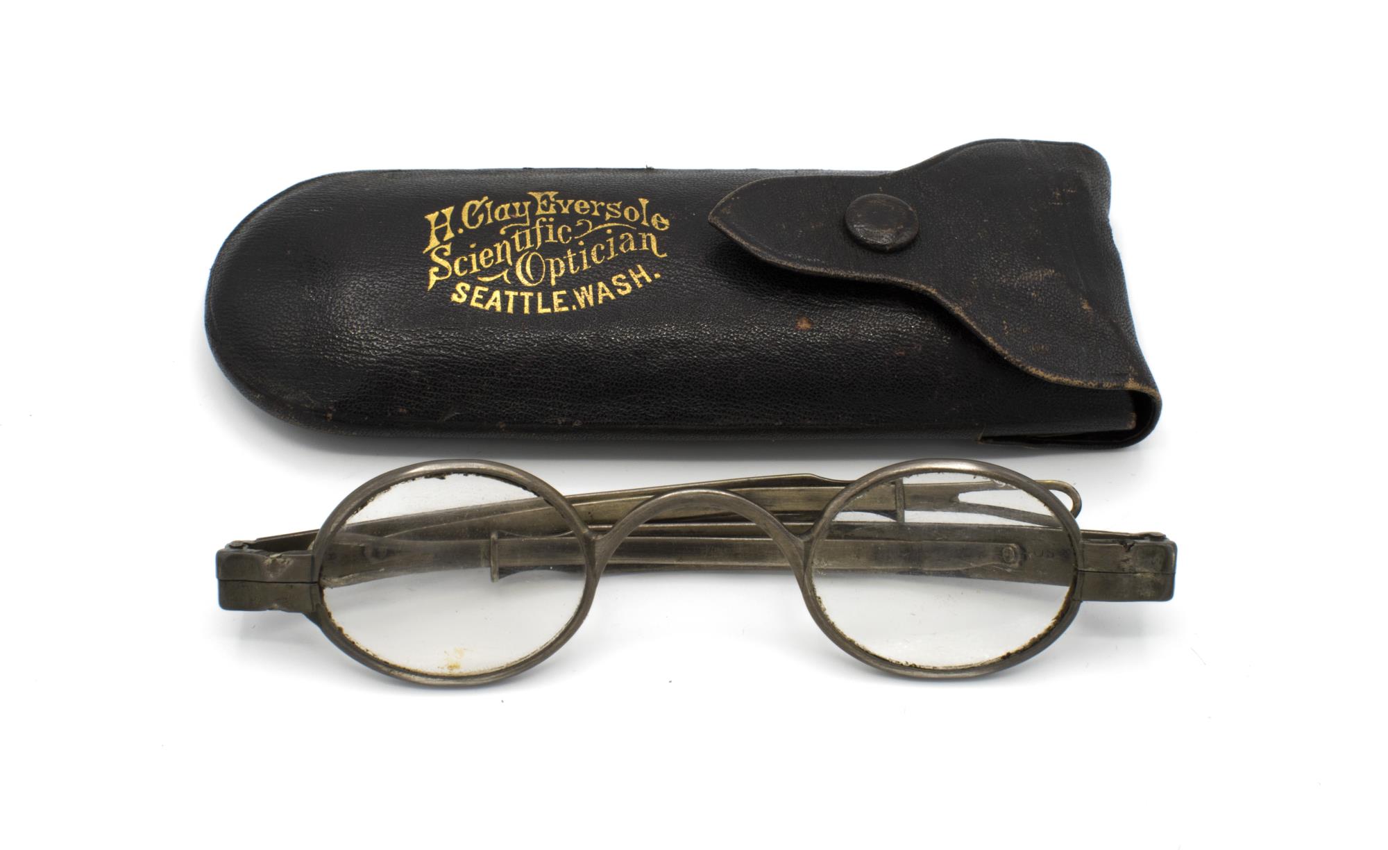 Image of Eyeglasses with metal rims and retractable bows, worn by Thomas B. Elder, a Seattle pioneer of 1883