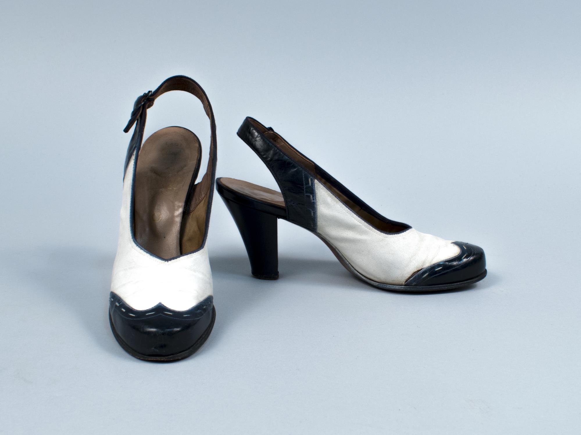 Image of Pair of blue and white sling heels, ca. 1951