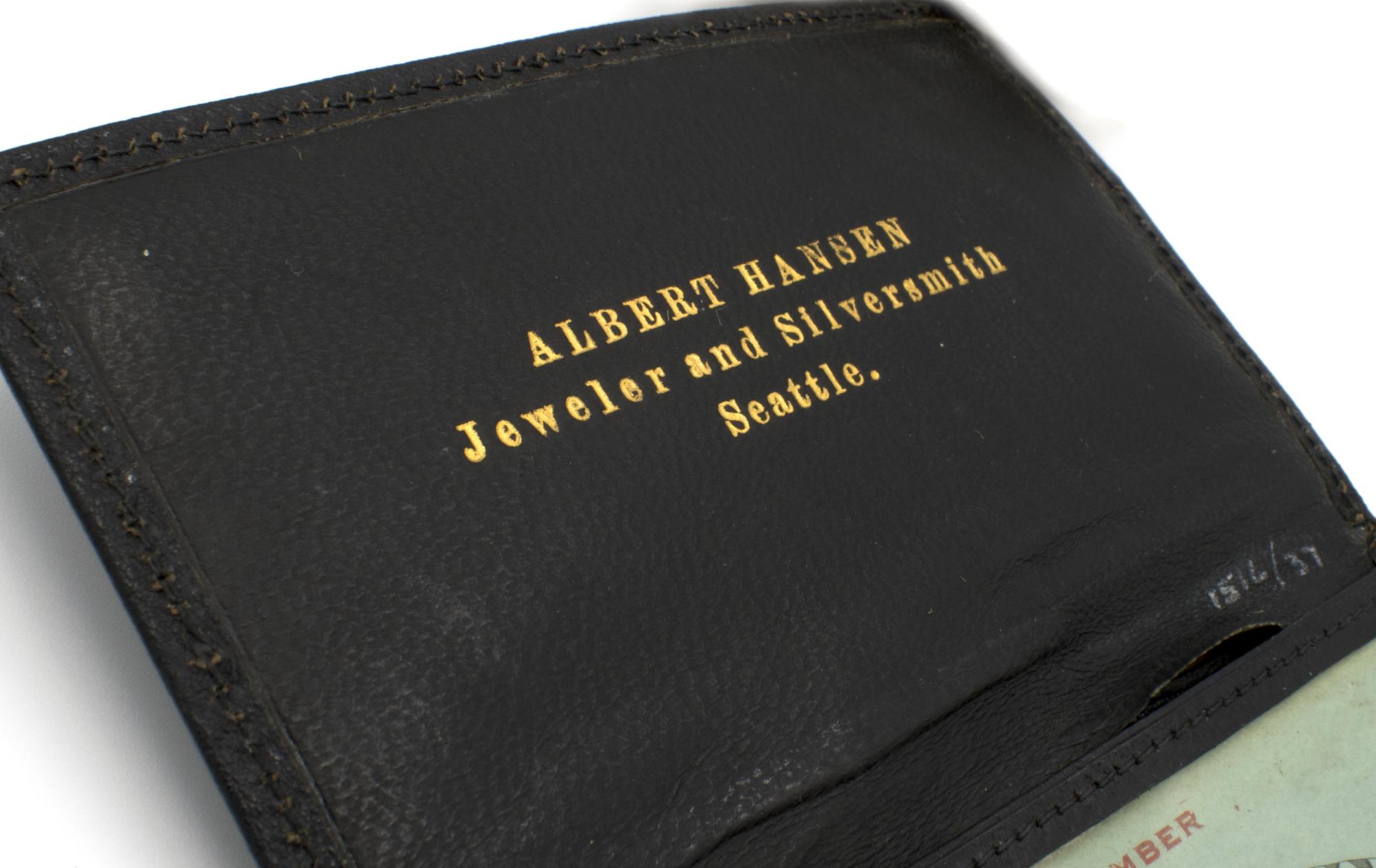 Image of Leather card case for Arctic Club member Dr. Alfred Raymond, 1910