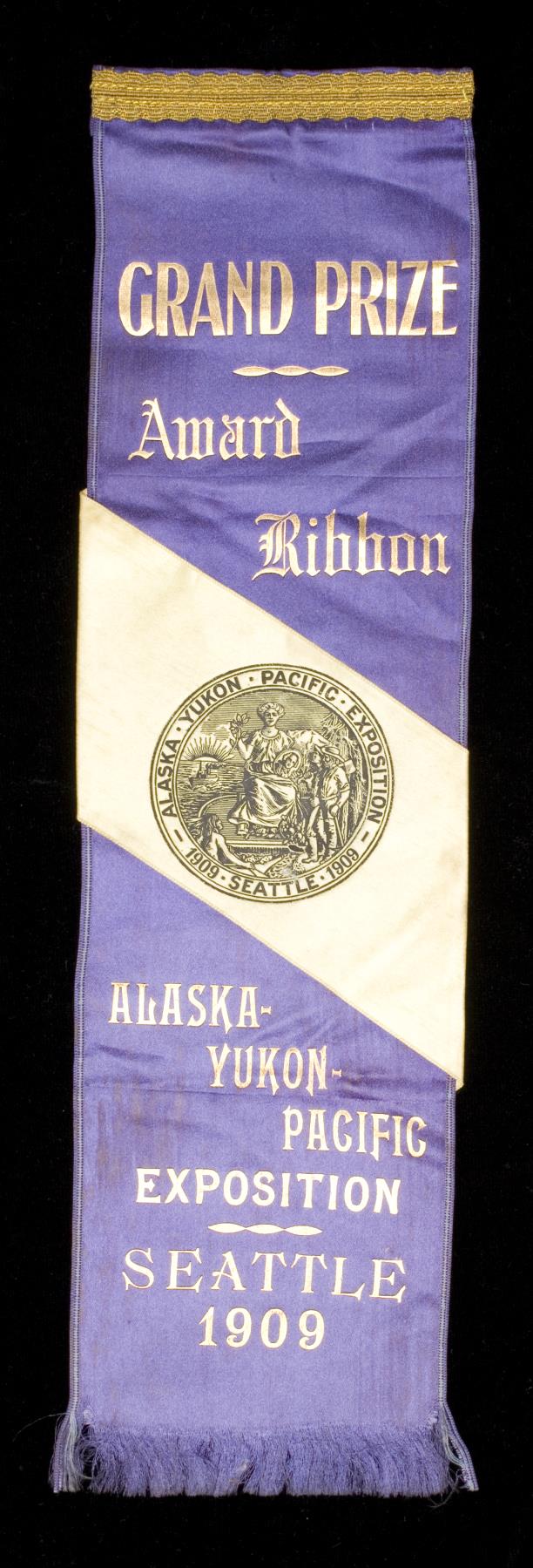 Image of Alaska-Yukon-Pacific Exposition (AYPE) Grand Prize ribbon awarded for Irish lace collar, 1909