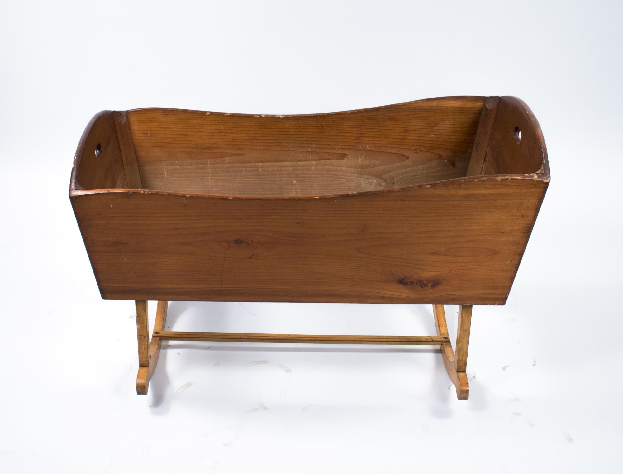 Image of Wooden baby cradle made by Julius Christison, 1893