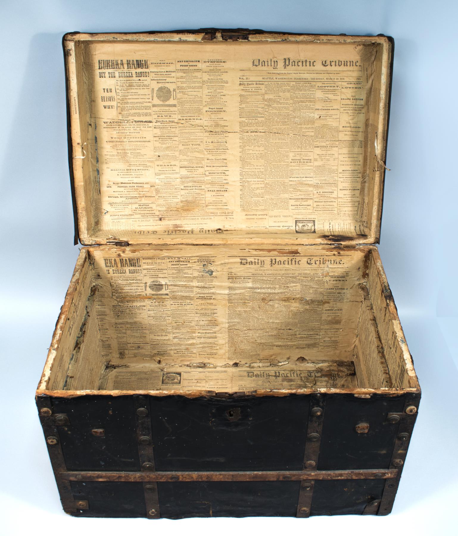 Image of Trunk lined with newspapers from the Washington Territory, 1875-1876