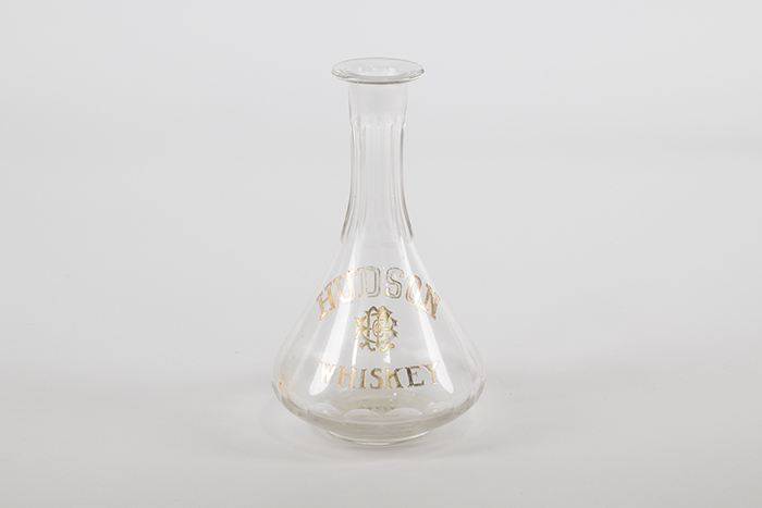 Image of Set of four liquor bottles from the Our House restaurant and hotel in Seattle, ca. 1898-1958
