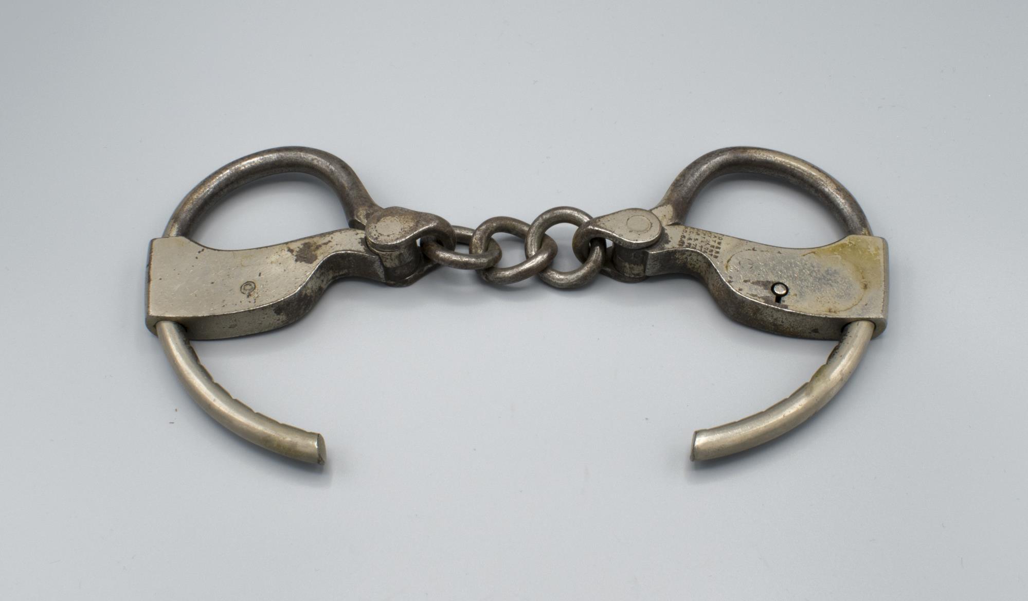 Image of Seattle Police Department handcuffs belonging to John Reitz, ca. 1900