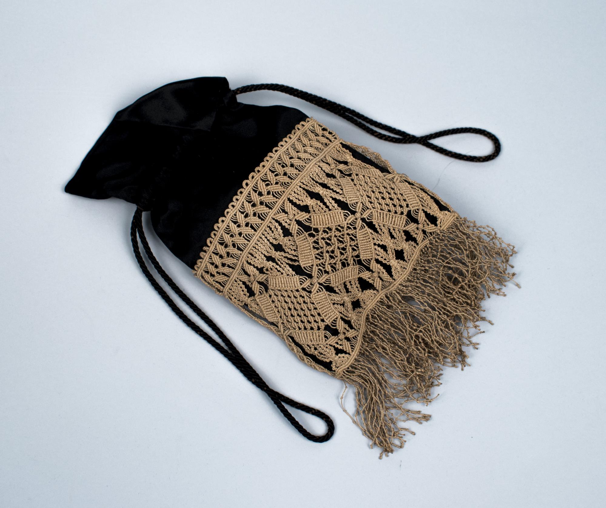 Image of Black satin reticule owned by early Seattle school teacher, ca. 1870s