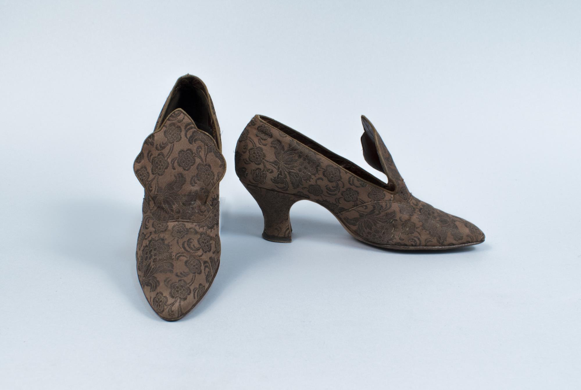 Image of Tan brocade pumps with Louis XIV heels, ca. 1915