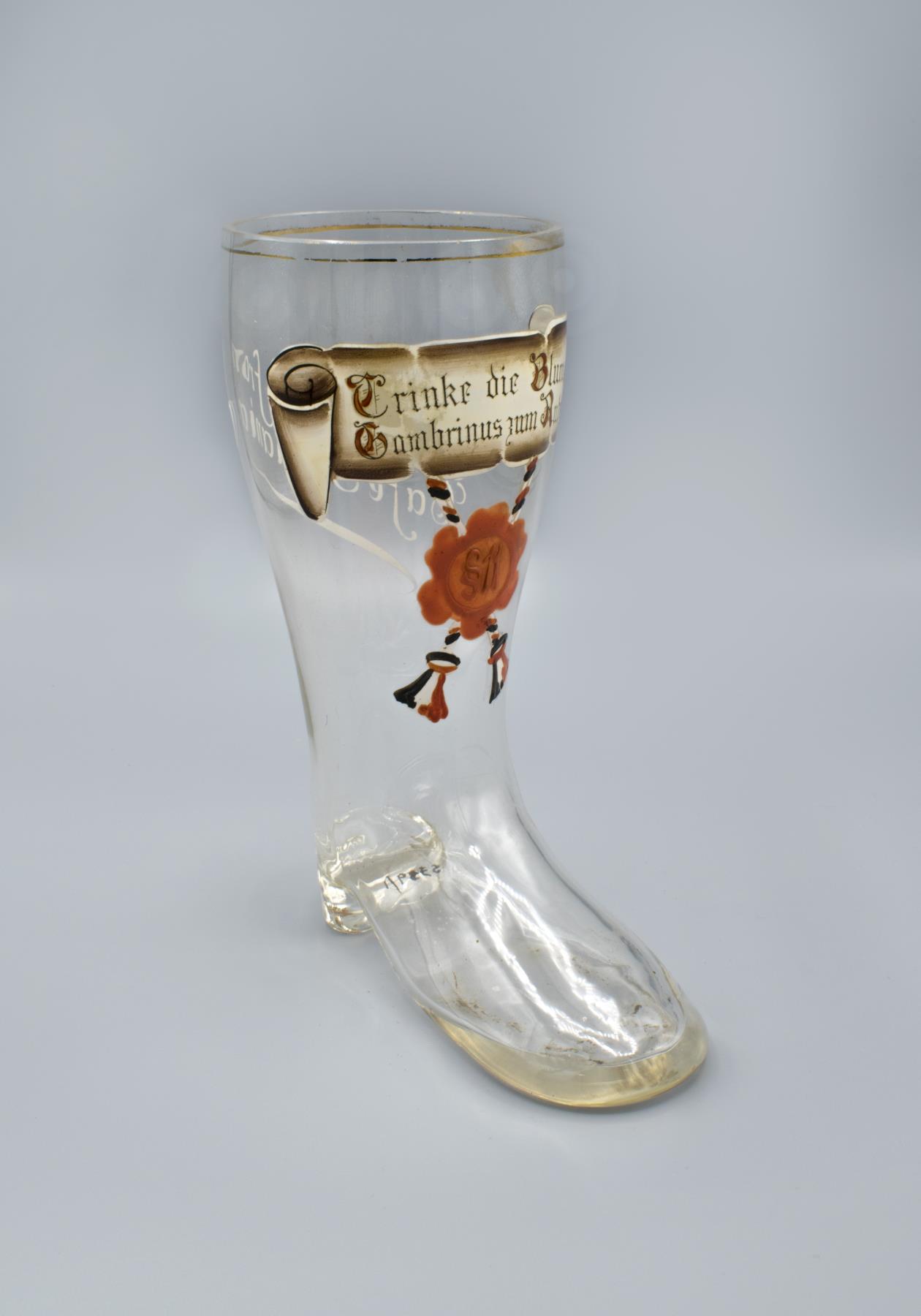 Image of Souvenir boot-shaped beer glass from Café Germania in Seattle, ca. 1901-1916