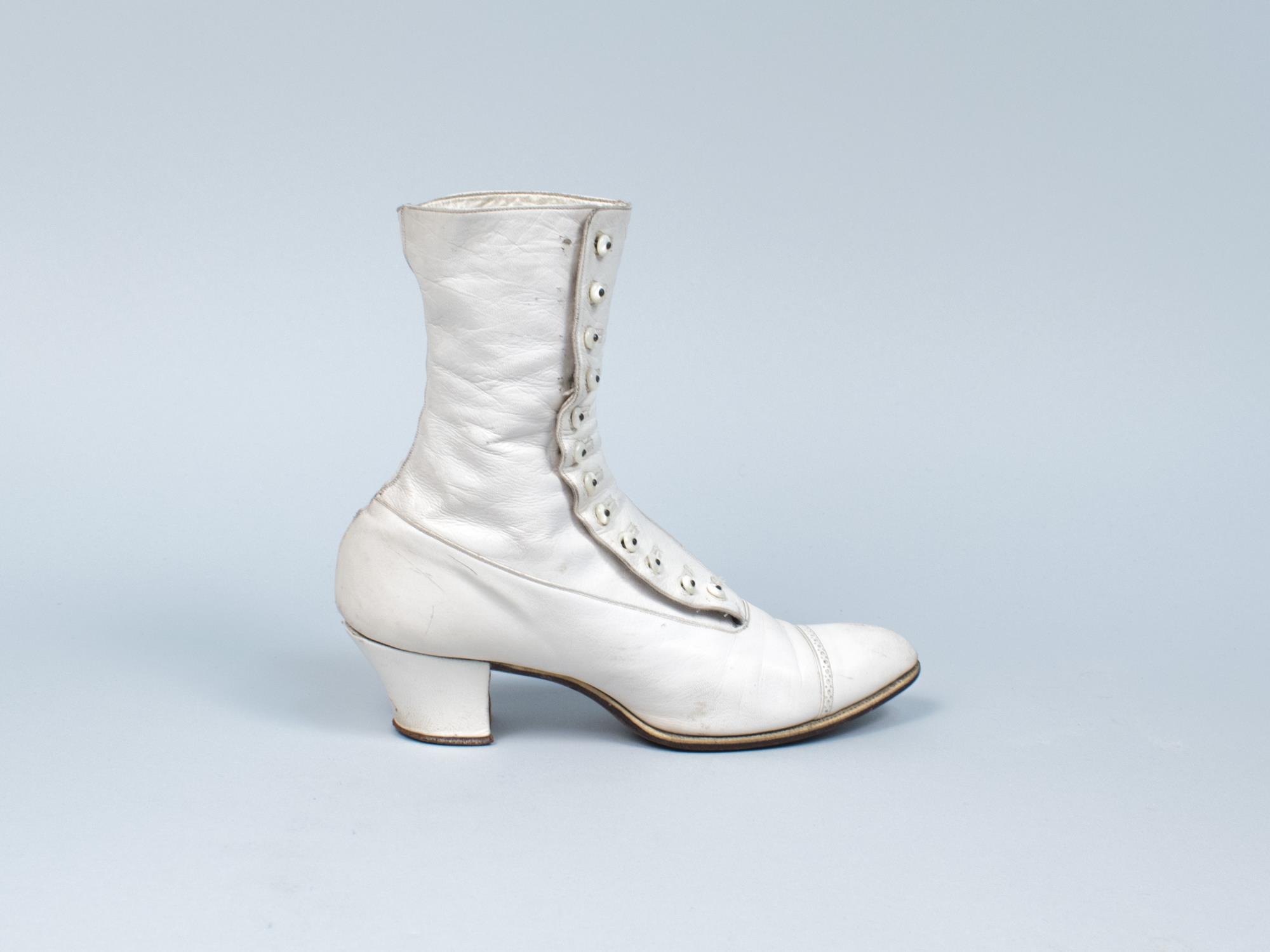 Image of White leather high button shoes, ca. 1917