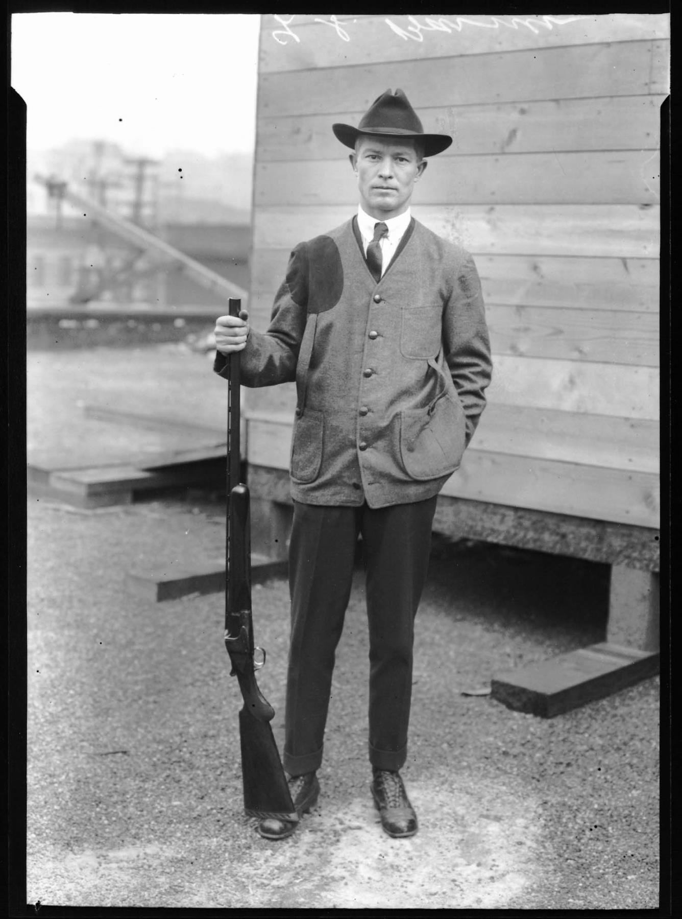 Image of Trapshooter L.S. Barnes with gun, Seattle, circa 1920