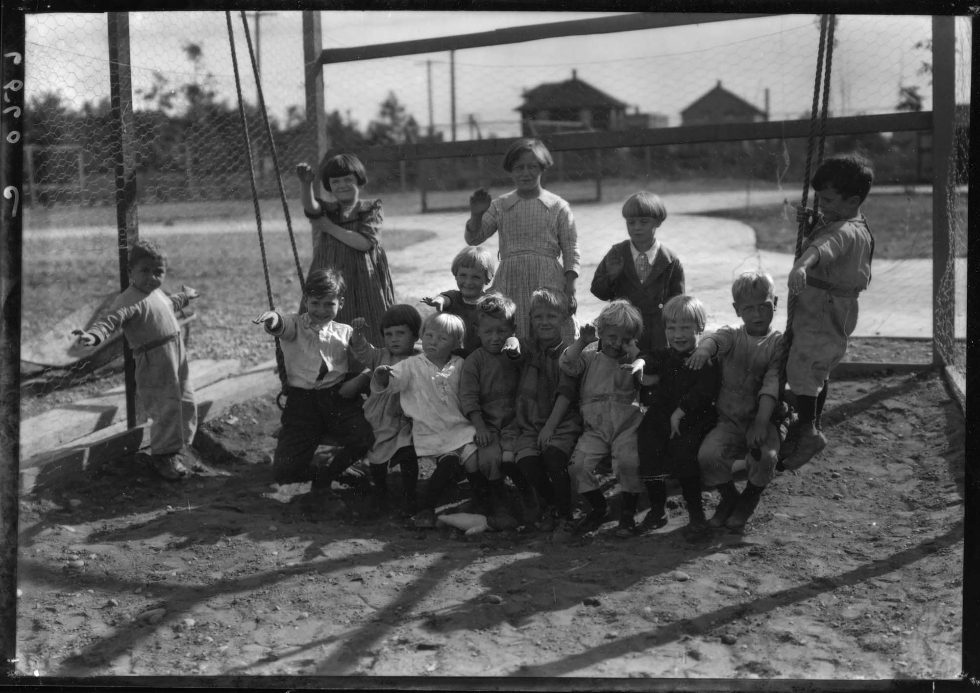 Image of Ryther Home residents at playground, Seattle, circa 1930