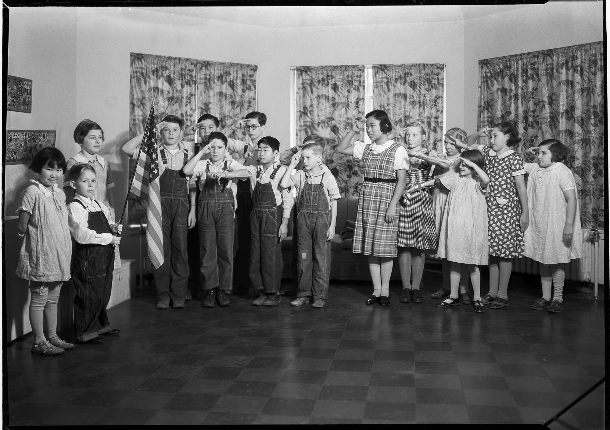 Image of Children saluting flag at Junior League Convalescent Home, Seattle, 1934