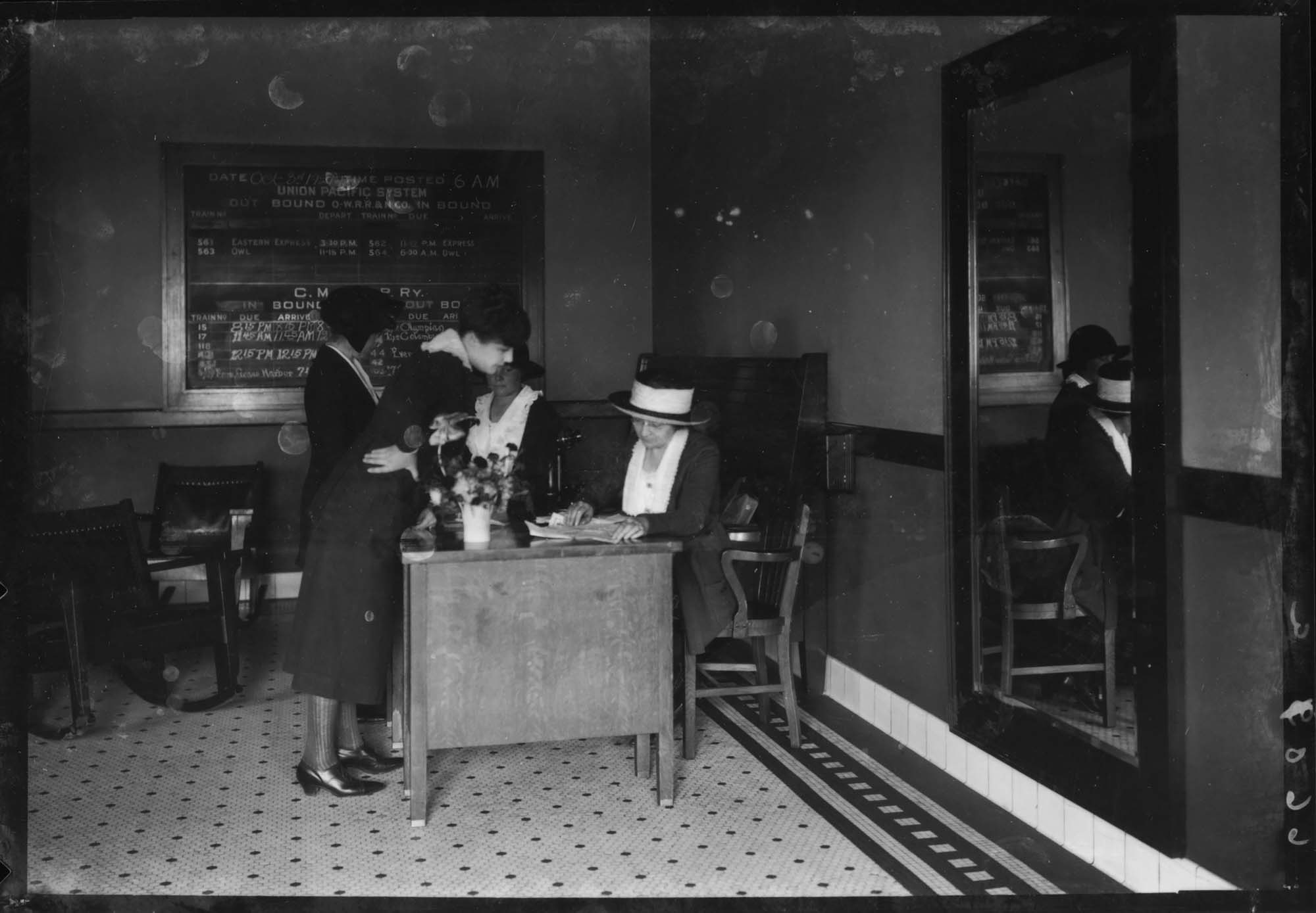 Image of Traveler's aid desk at Oregon-Washington Station, Seattle, circa 1925