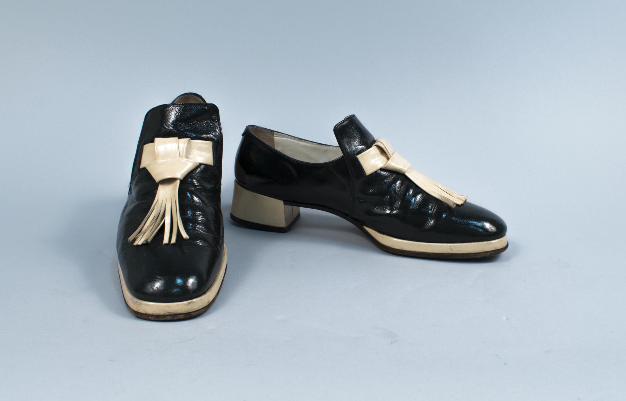 Image of Green and white leather shoes worn by John Doyle Bishop, ca. 1970s