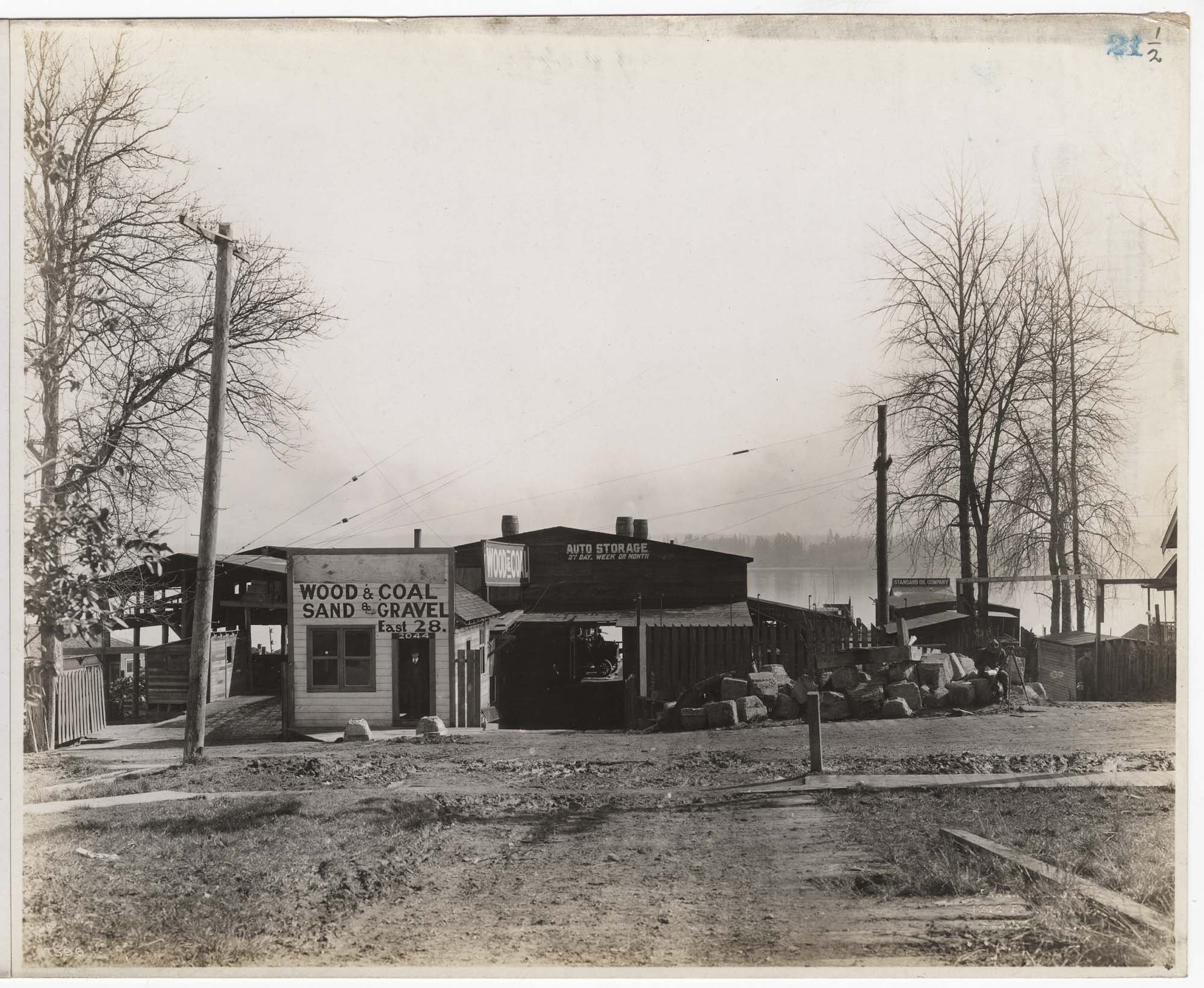 Image of Coal yard at Madison Park showing street frontage on Laurelshade Avenue, Seattle, circa 1915