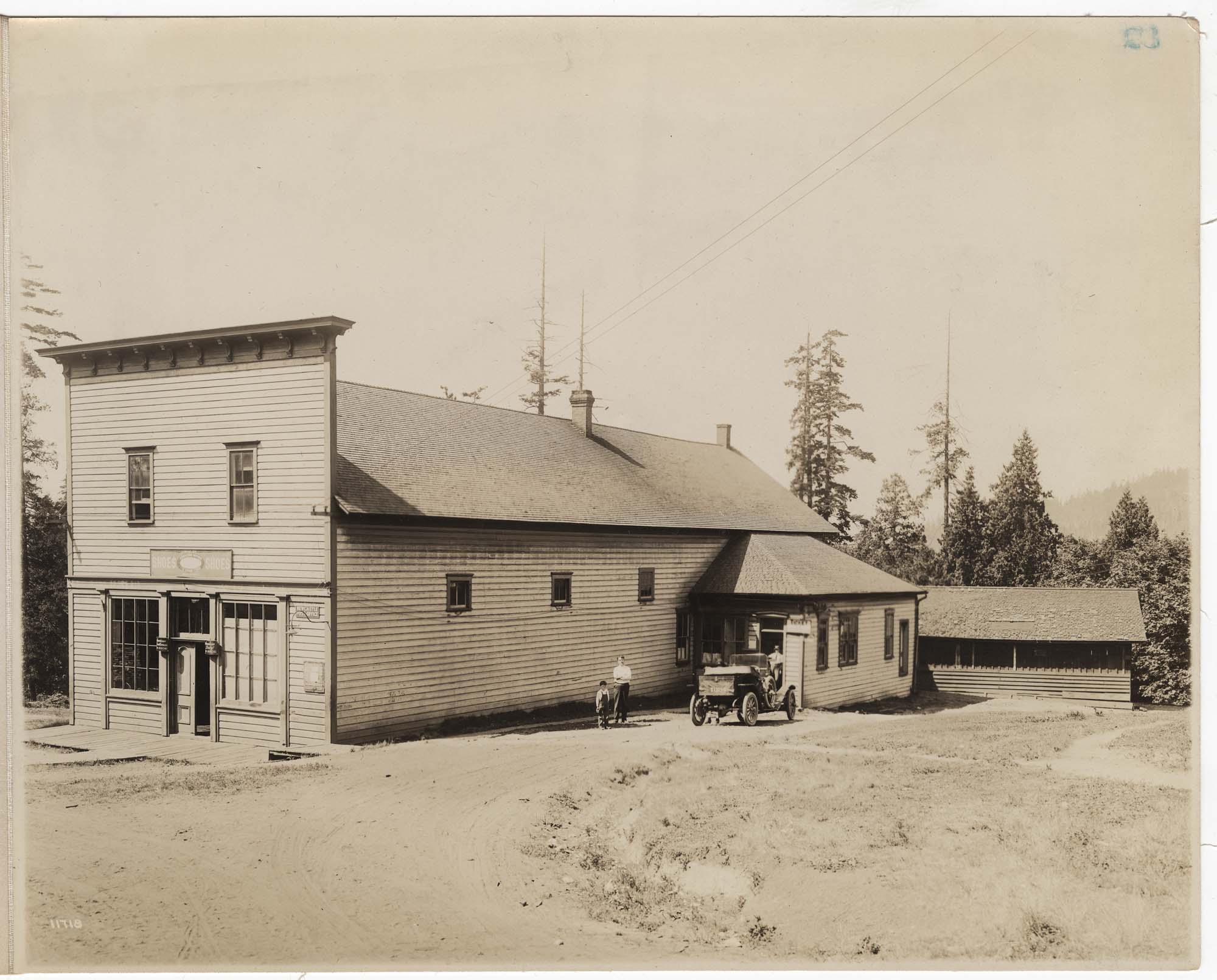 Image of Columbia & Puget Sound Railroad ticket office and freight warehouse, Newcastle, circa 1915