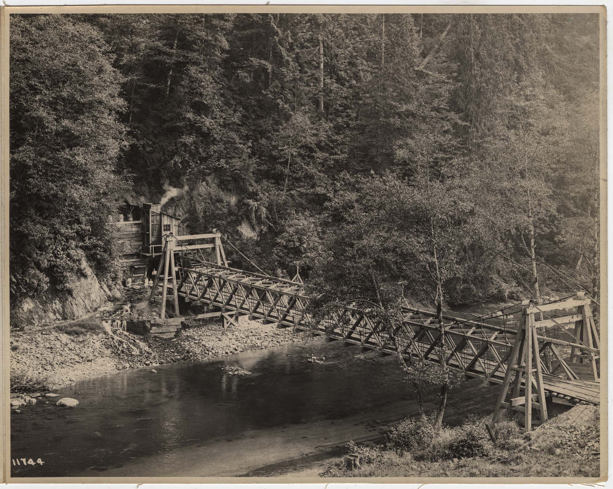Image of Cannon Mine trestle across Green River and mount of mine, Franklin, circa 1915