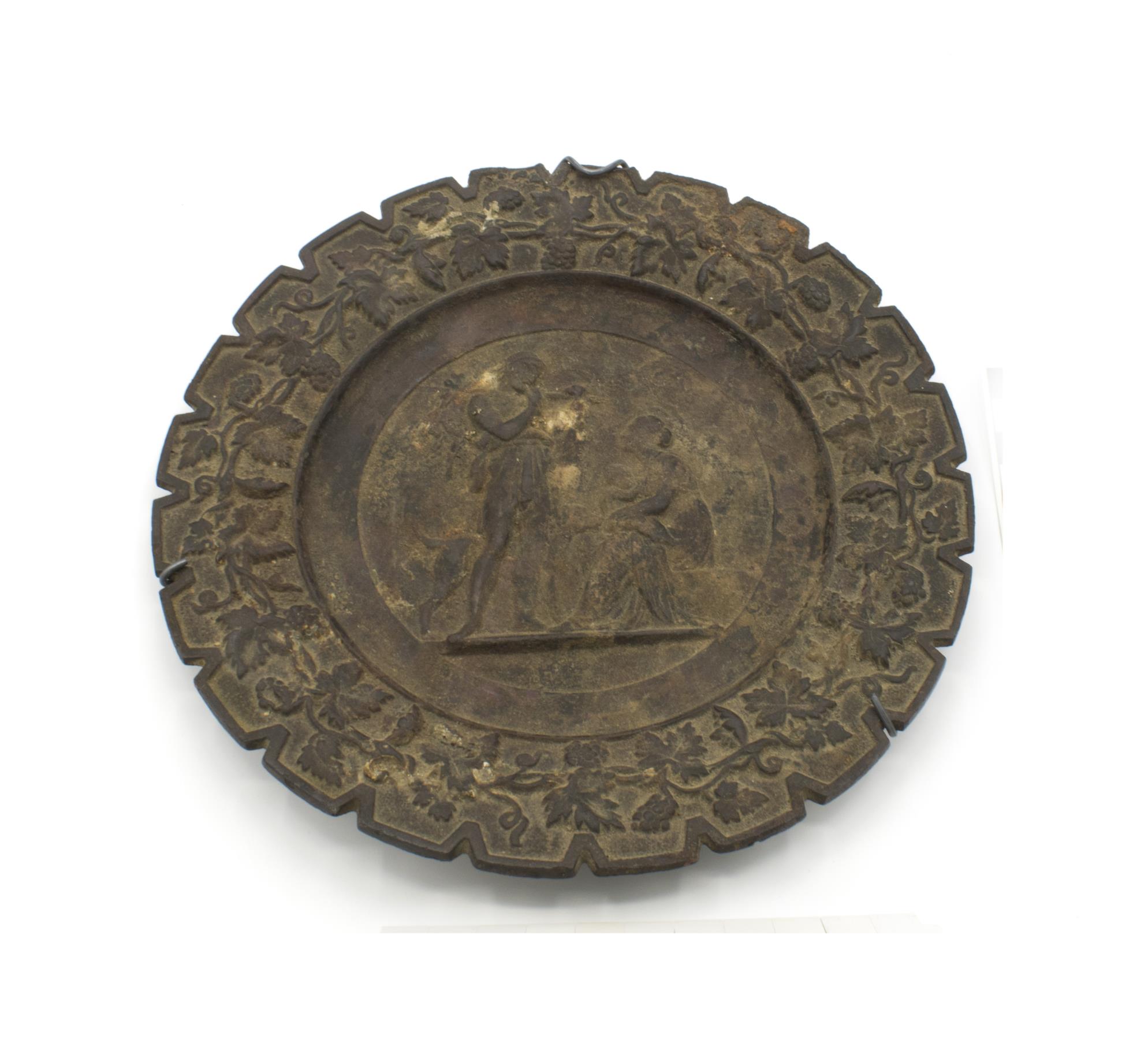 Image of Cast iron decorative plate recovered from the Great Seattle Fire, ca. 1880