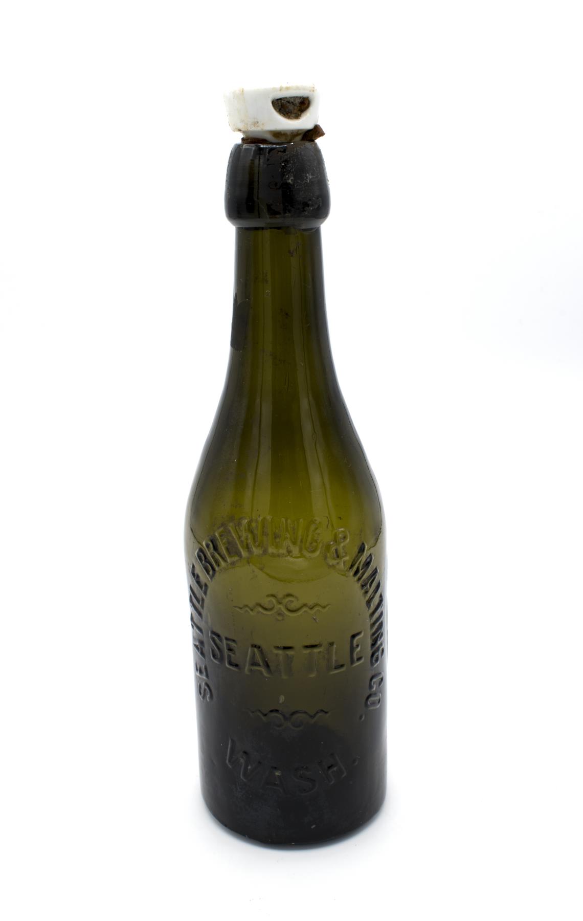 Image of Green glass beer bottle, Seattle Brewing & Malting Company, ca. 1892