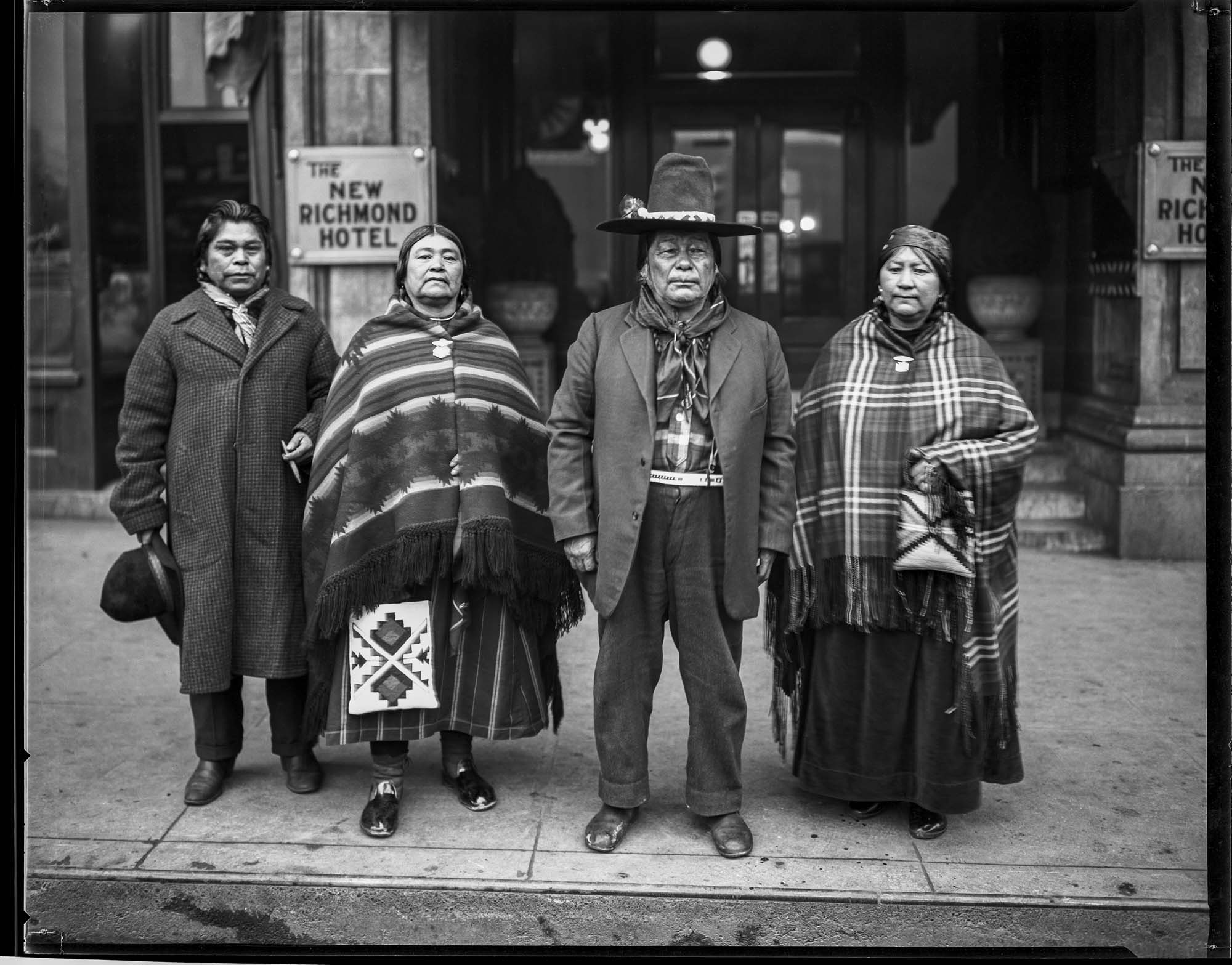 Image of Two Yakama couples outside a Seattle hotel, January 29, 1921