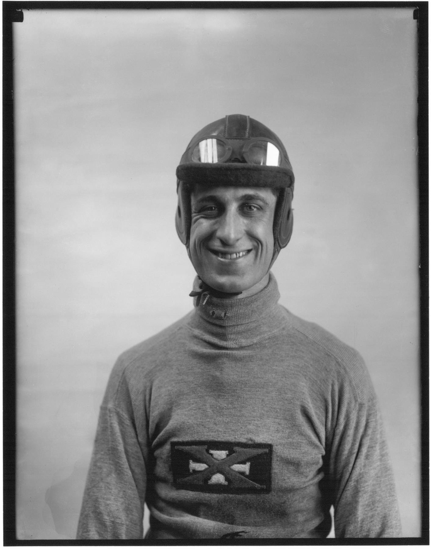 Image of Motorcyclist in helmet, probably in Seattle, circa 1913
