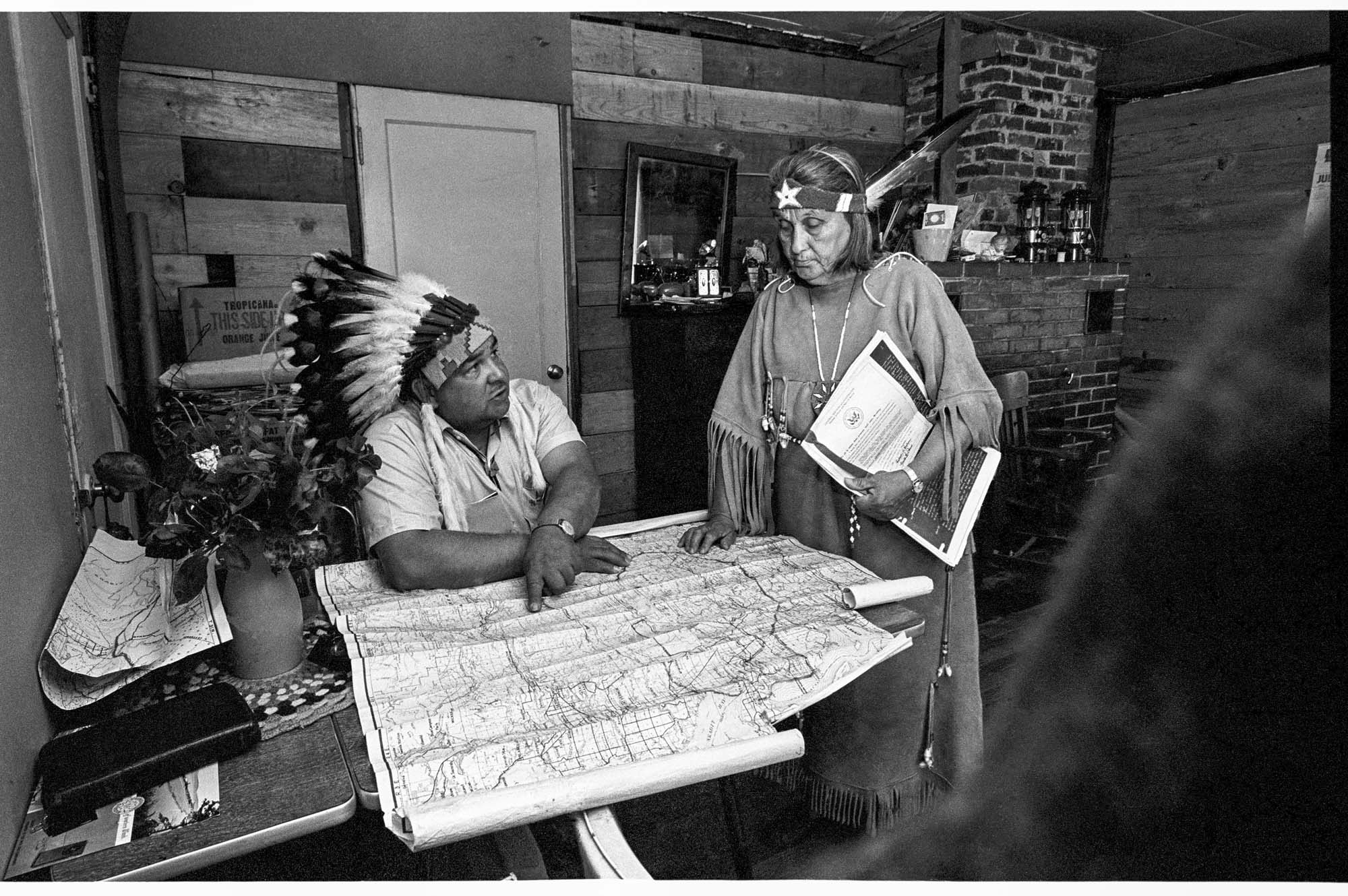 Image of Frank Allen and Esther Ross looking at map to plan tribal fish-in, 1968