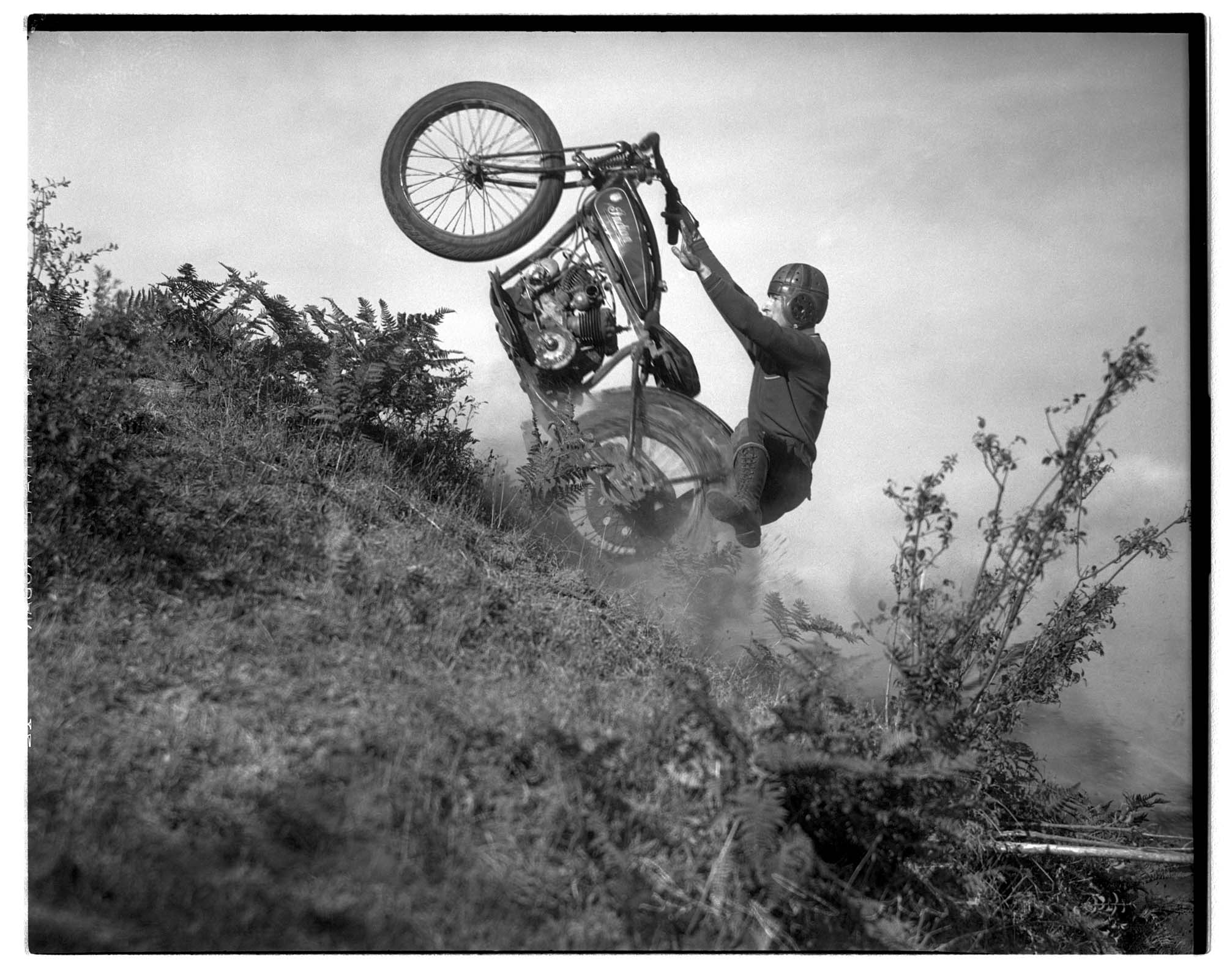 Image of Man riding Indian motorcycle, 1934