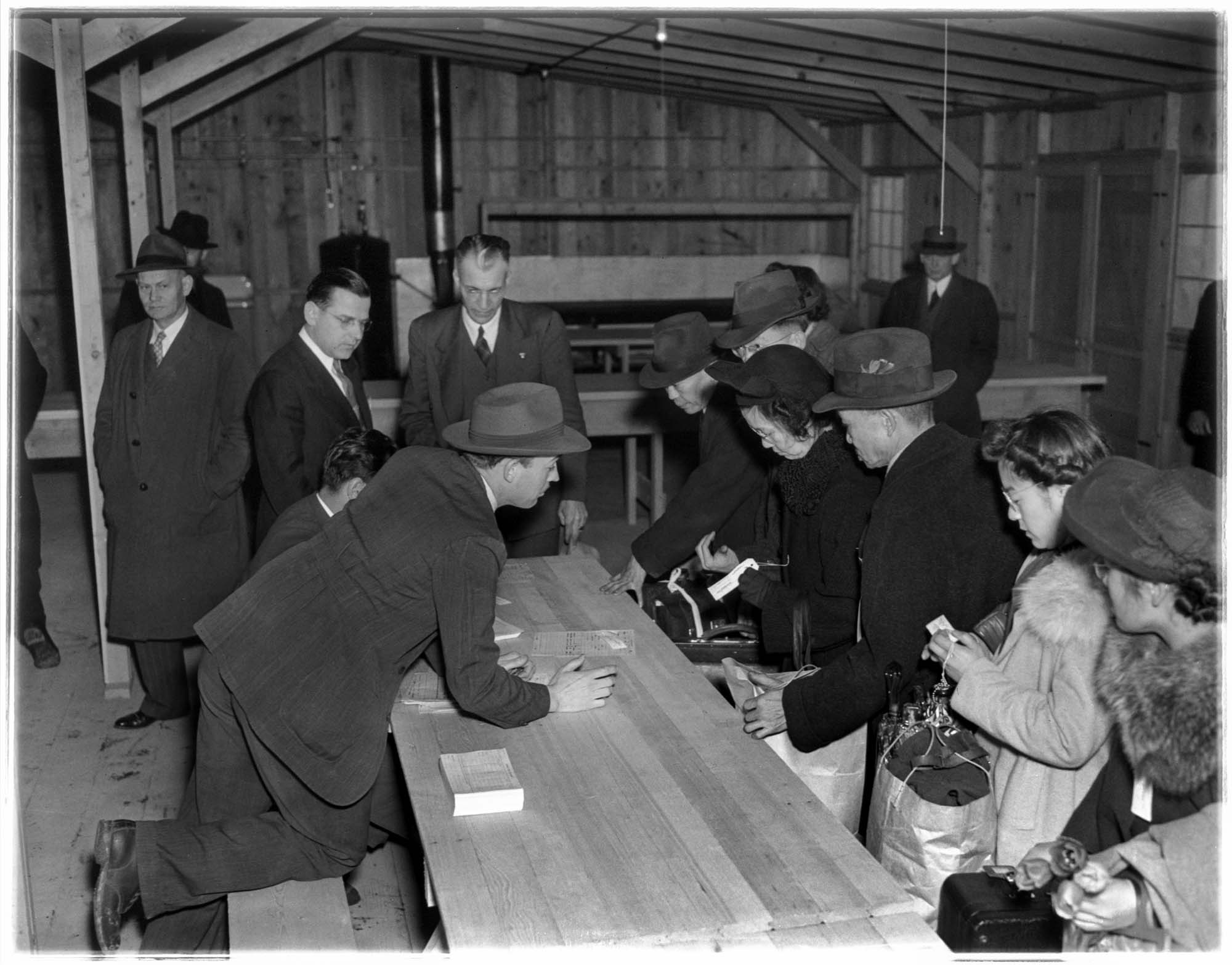 Image of Incarcerees registering at the Puyallup Assembly Center, Puyallup, 1942