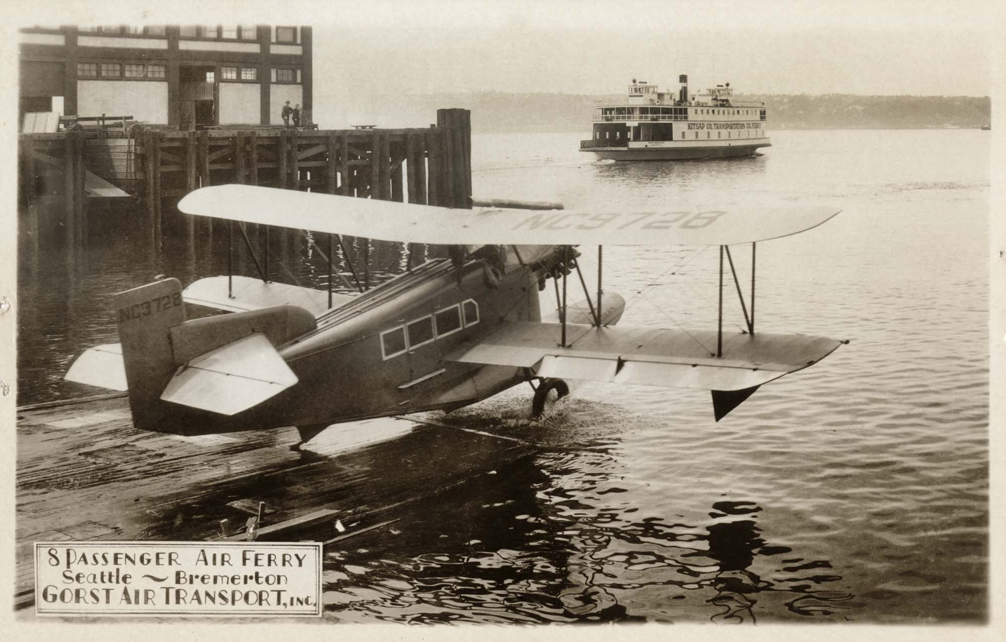 Image of Gorst Air Transport seaplane with ferry in background, Seattle, circa 1933