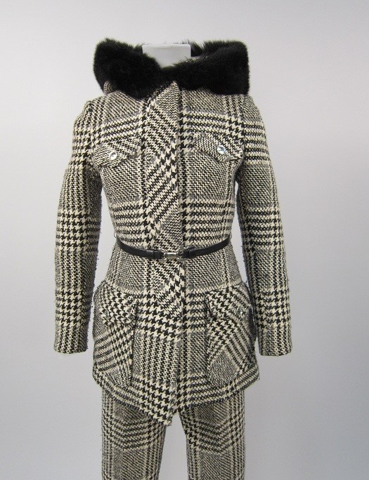 Image of Black and white houndstooth pantsuit worn by Peggy Corley, 1973