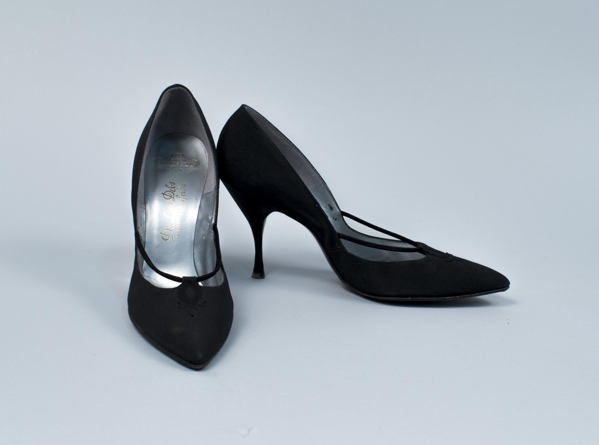 Image of Pair of back stiletto heels, ca. 1963