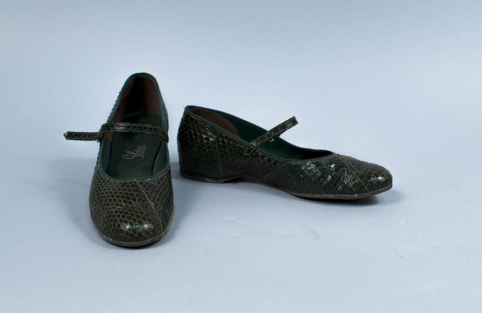 Image of Pair of green cobra leather flats, ca. 1961