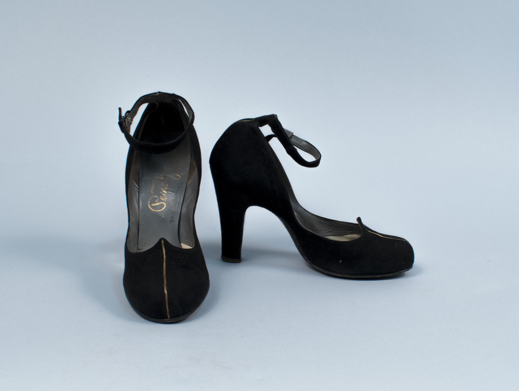 Image of Pair of black pumps with gold cording, ca. 1945