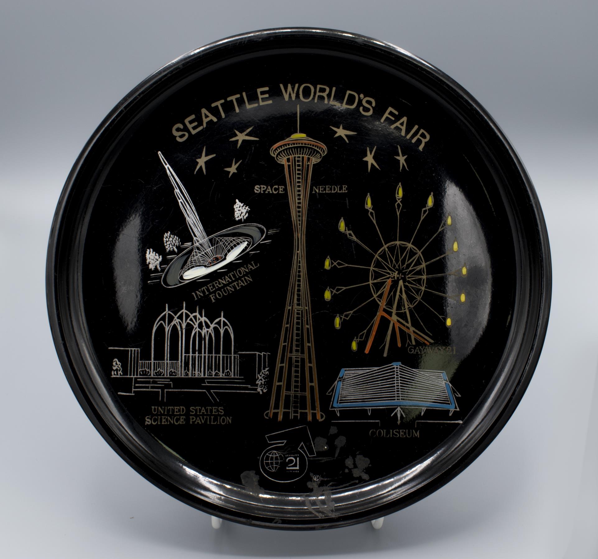 Image of Round black plastic serving tray, souvenir from Century 21 Seattle World's Fair, 1962