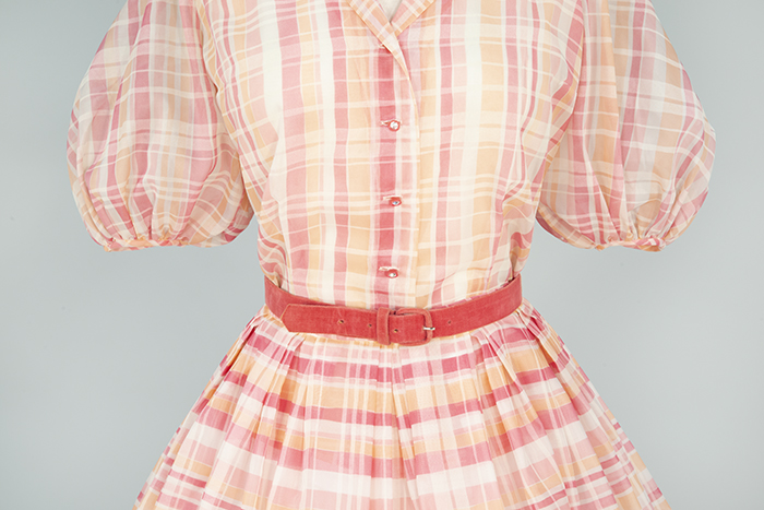Image of Orange and pink dress ensemble with suede belt, ca. 1957