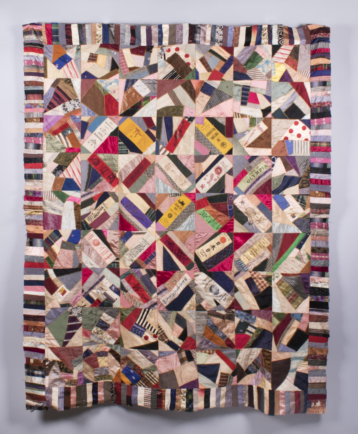 Image of Crazy quilt featuring commemorative ribbons from the Alaska-Yukon-Pacific Exposition (AYPE), 1911