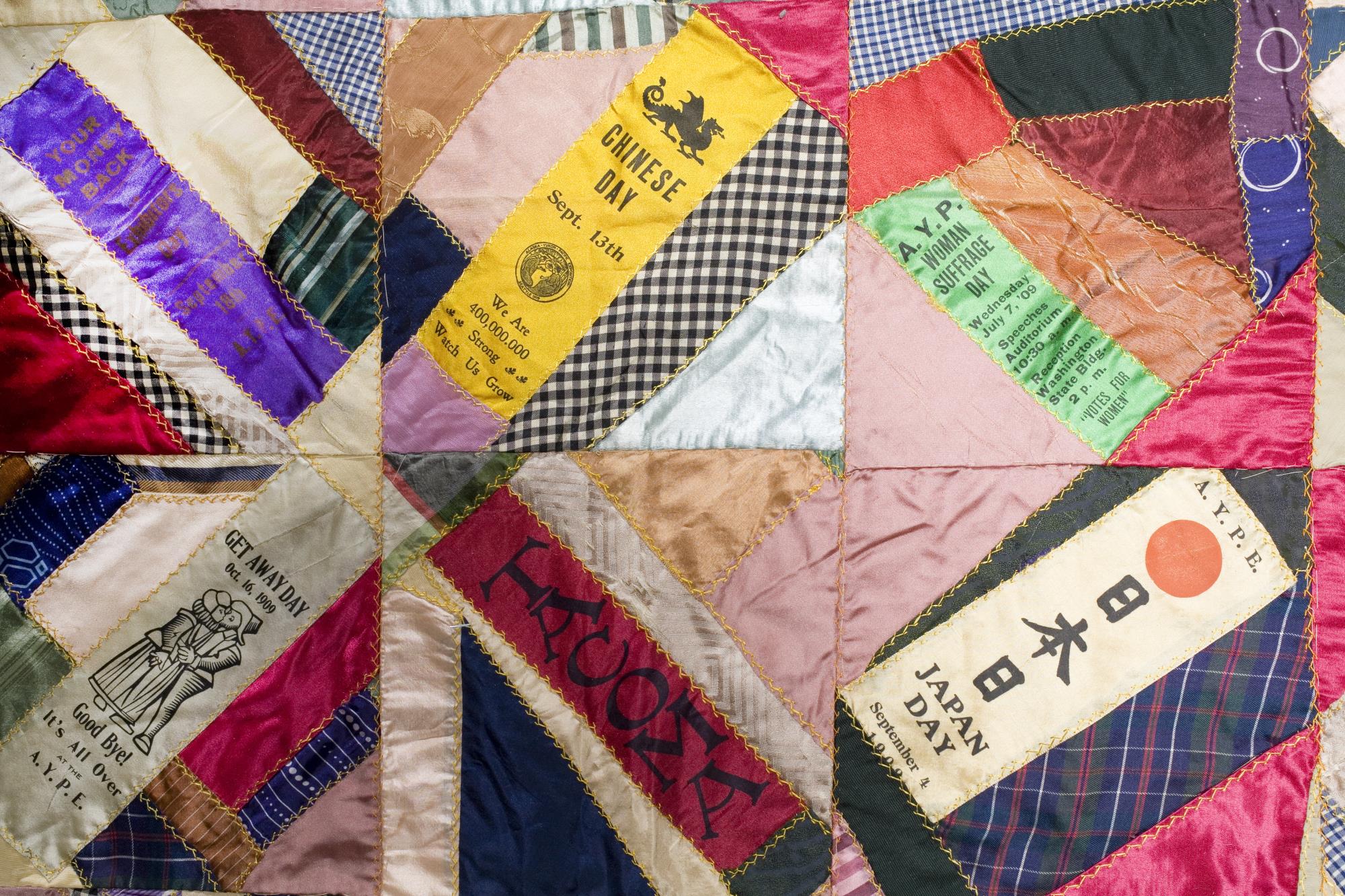 Image of Crazy quilt featuring commemorative ribbons from the Alaska-Yukon-Pacific Exposition (AYPE), 1911