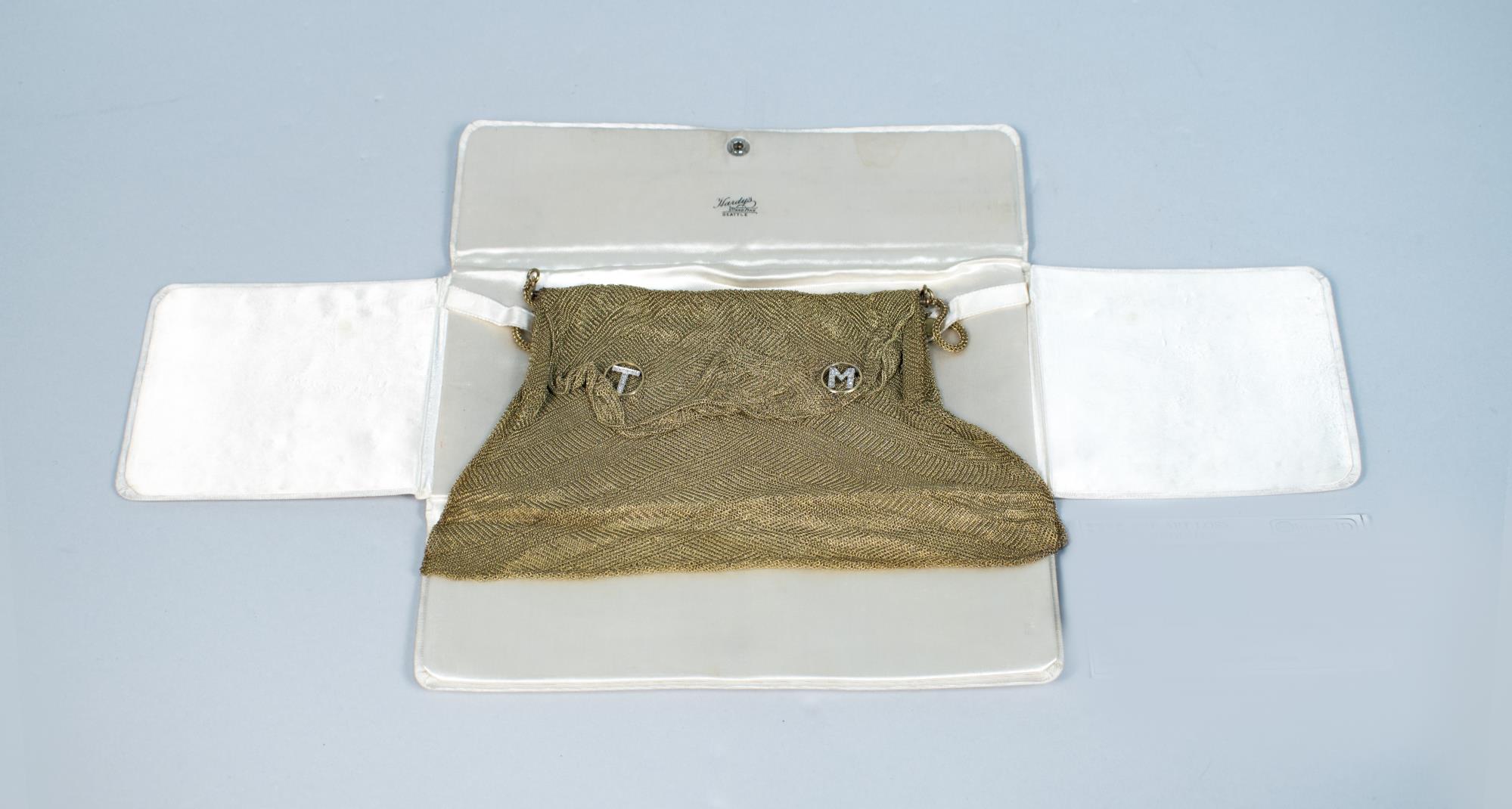Image of White cloth case to hold gold mesh purse, ca. 1930-1940