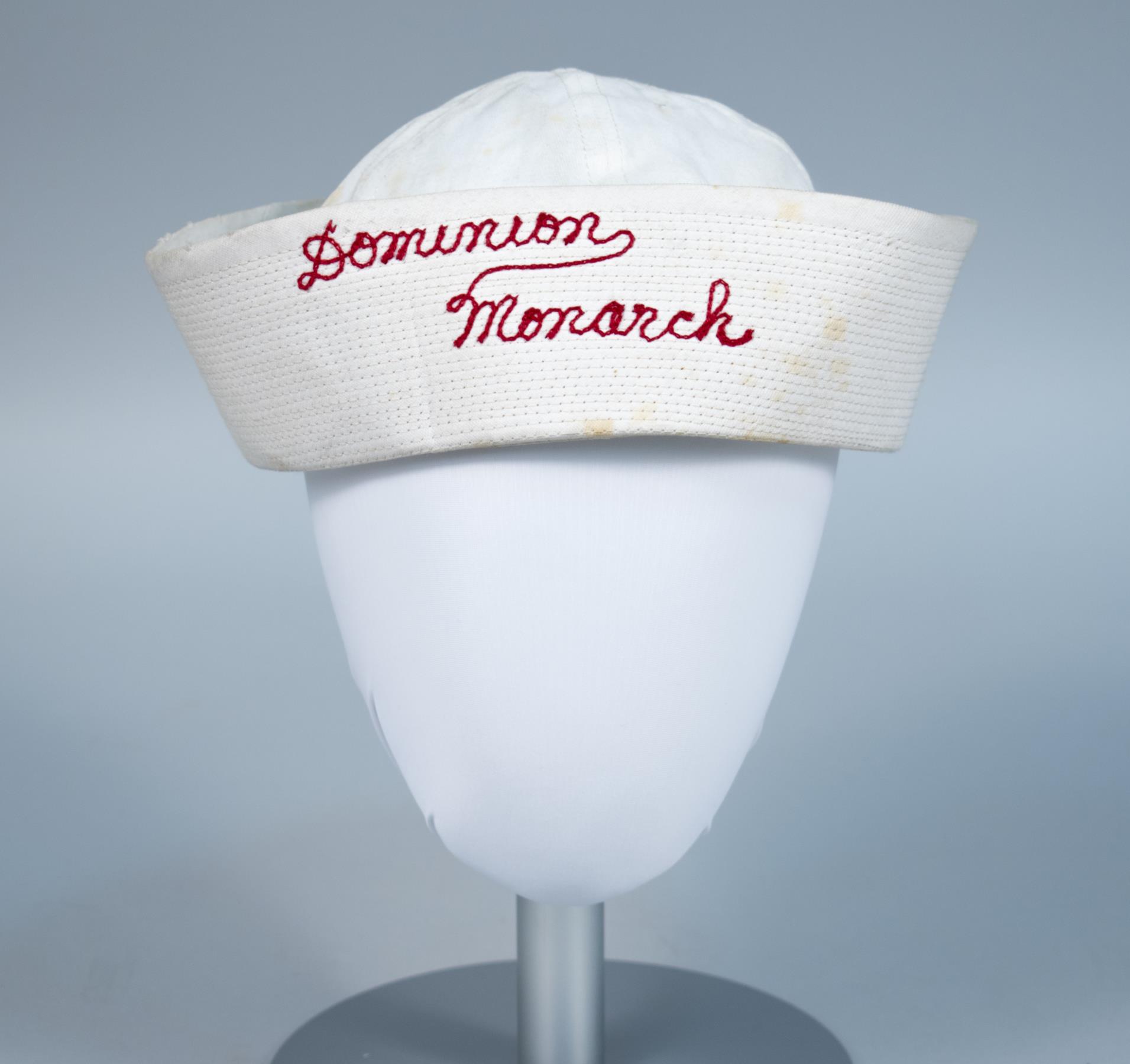 Image of Sailor-style hat worn by tour guides on the Dominion Monarch, 1962