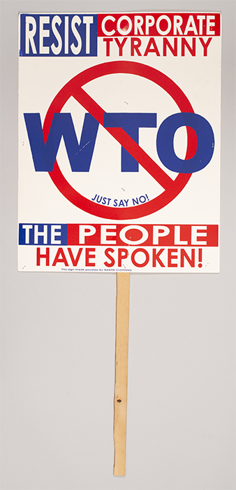 Image of Picket sign from the 1999 World Trade Organization conference (WTO) protests in Seattle