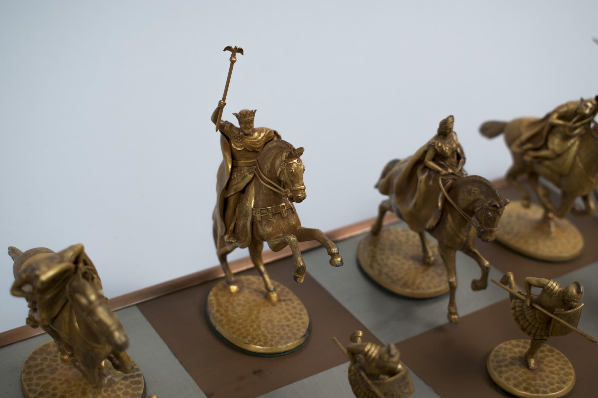 Image of Chess set made in 1946 by Seattle jeweler Anchor O. Jensen and depicting the Roman Invasion of Gaul