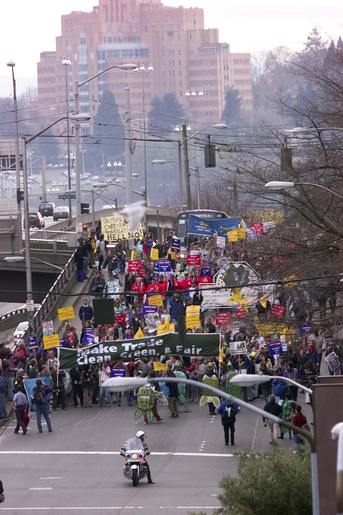 Image of WTO protest group walking north toward downtown Seattle, November 29, 1999