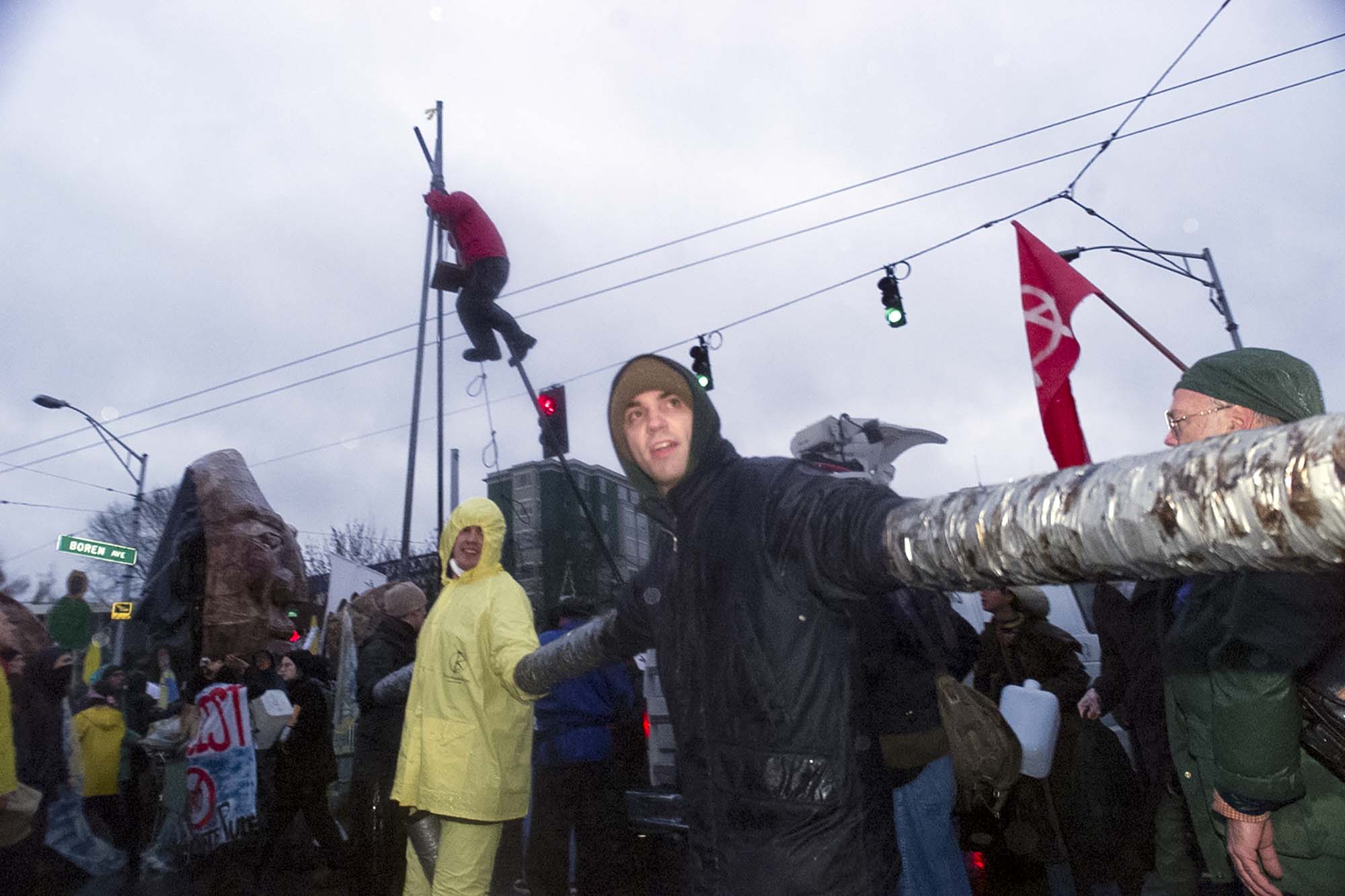 Image of WTO protesters with arms joined by pipe, Seattle, November 30, 1999