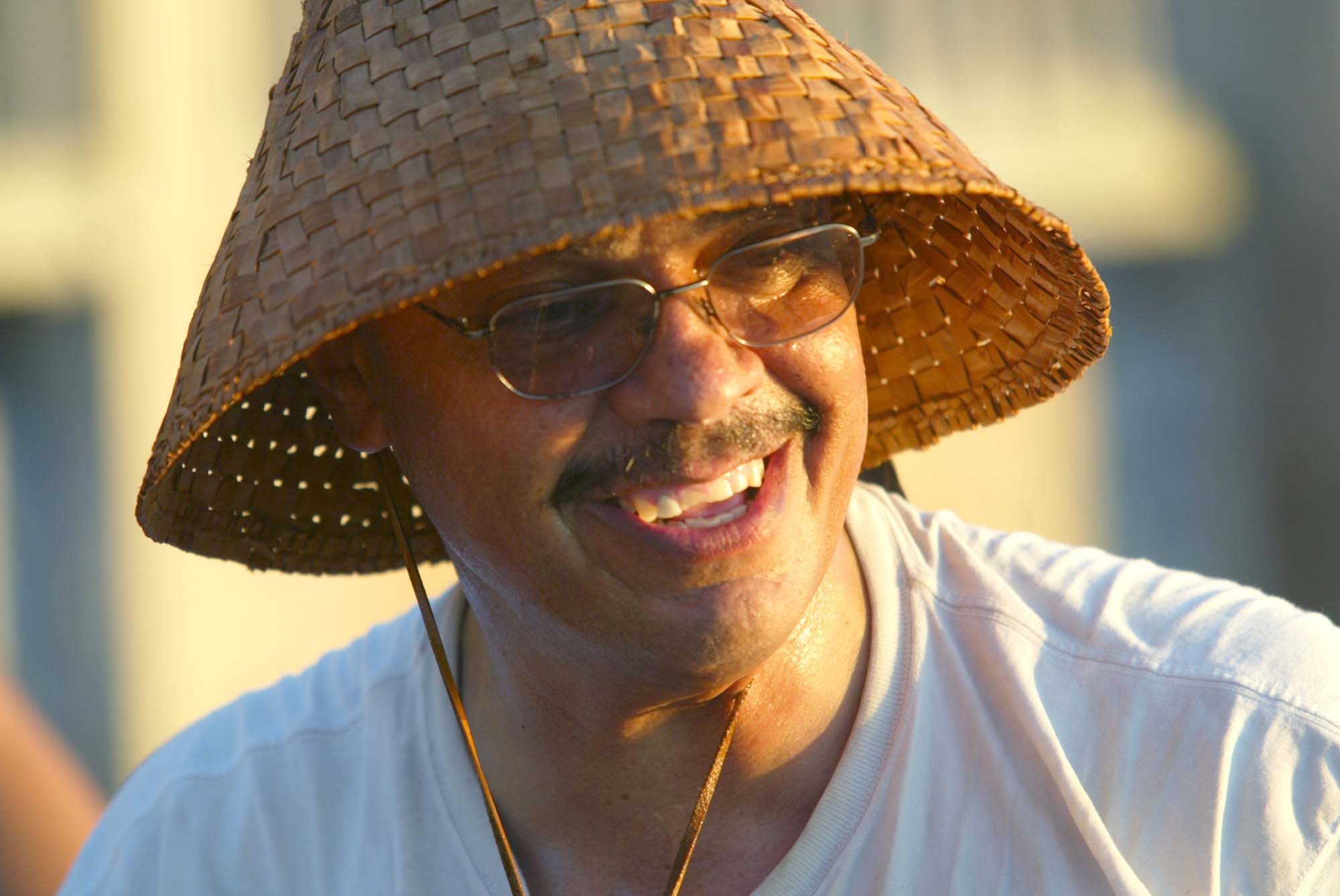 Image of Mike Evans (Snohomish) wearing a traditional cedar hat, Redondo Beach, August 2002