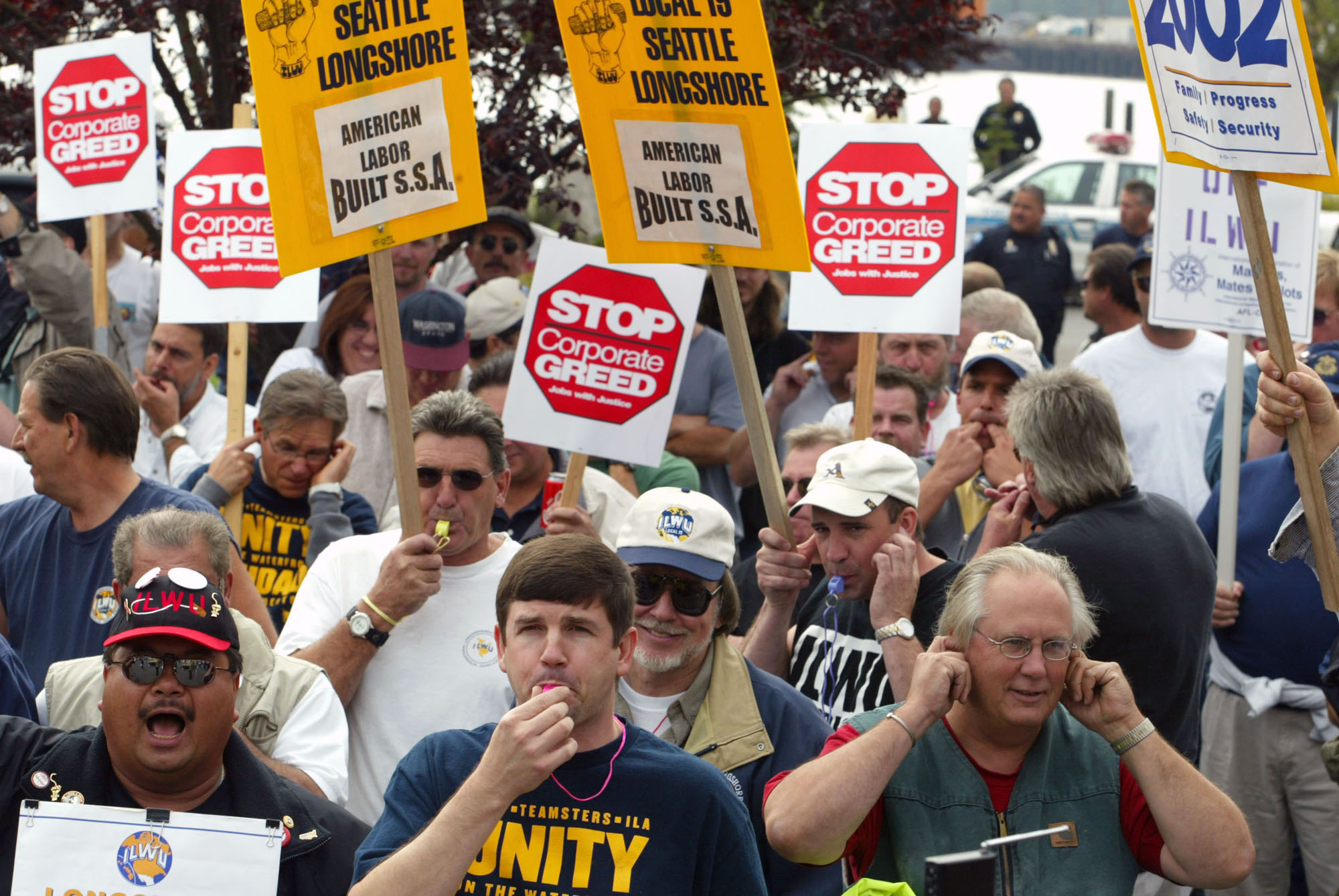 Image of Dockworkers rally in support of their union, Seattle, September 18, 2002