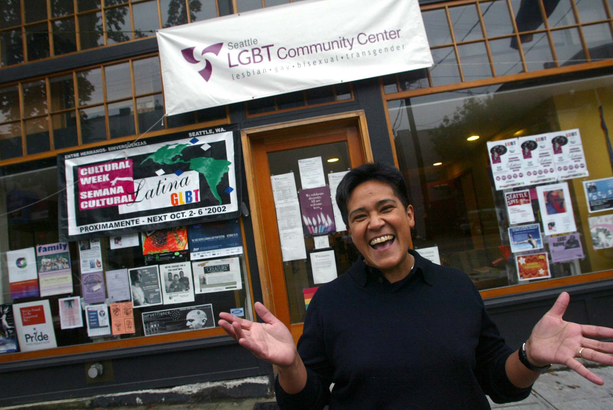 Image of Emma Moreno in front of the Seattle LGBT Community Center, October 3, 2002