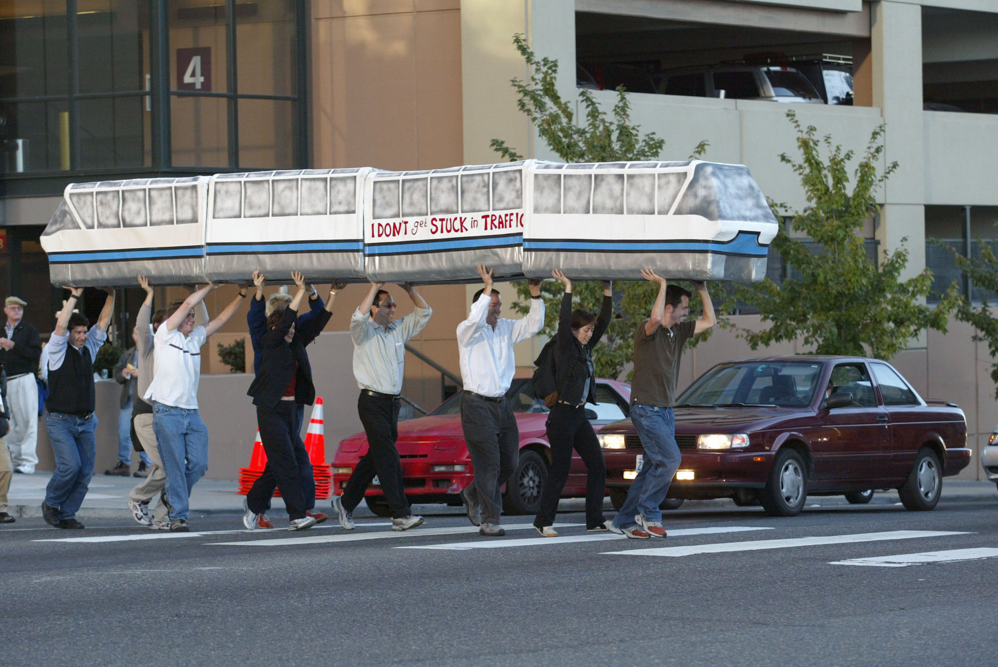 Image of Pro-monorail group demonstrating an alternate route to Seahawks Stadium, Seattle, October 14, 2002