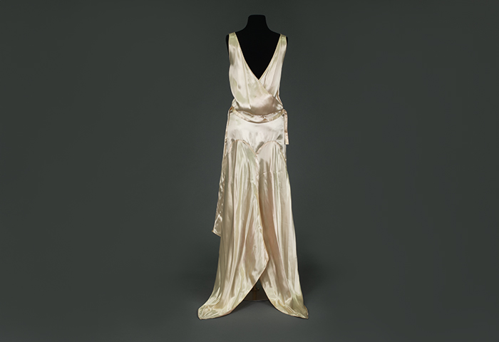 Cream silk satin evening dress, sold by Madame Thiry, ca. 1933 Museum of History & Industry Cream silk satin evening dress, sold by Madame Thiry, ca. 1933 Museum of History & Industry