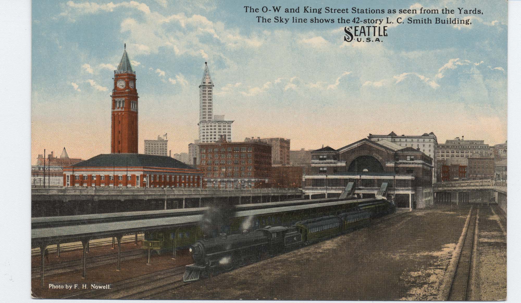 Image of King Street Station, Smith Tower, and Oregon-Washington Station from south, Seattle, circa 1915